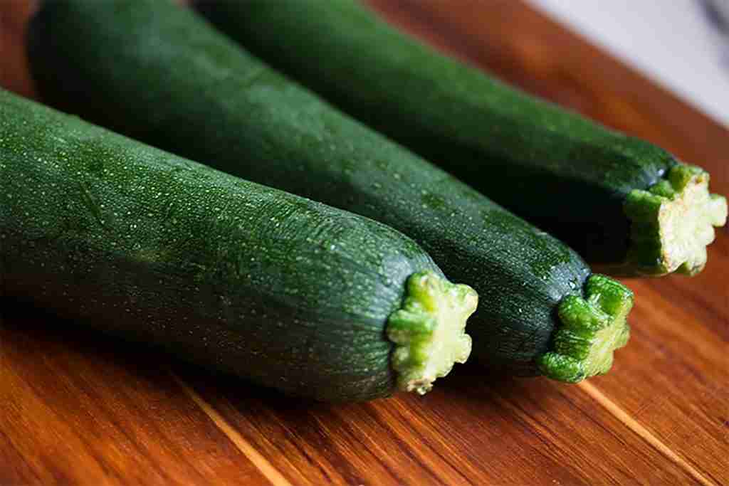 23 Fun Facts About Cucumbers | Secrets Revealed 2 3 Zuchini Brown Wooden Surface