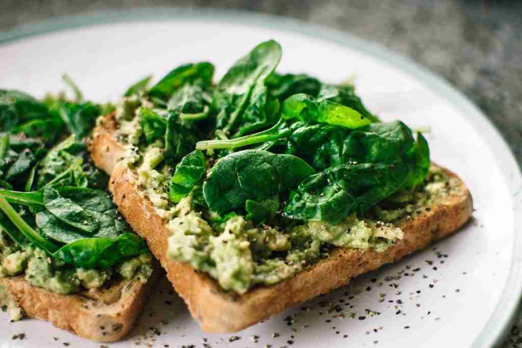 25 Fun Facts About Spinach: A Nutritious and Delightful Superfood 4 Basil Leaves and Avocado on Sliced Bread on White Ceramic Plate