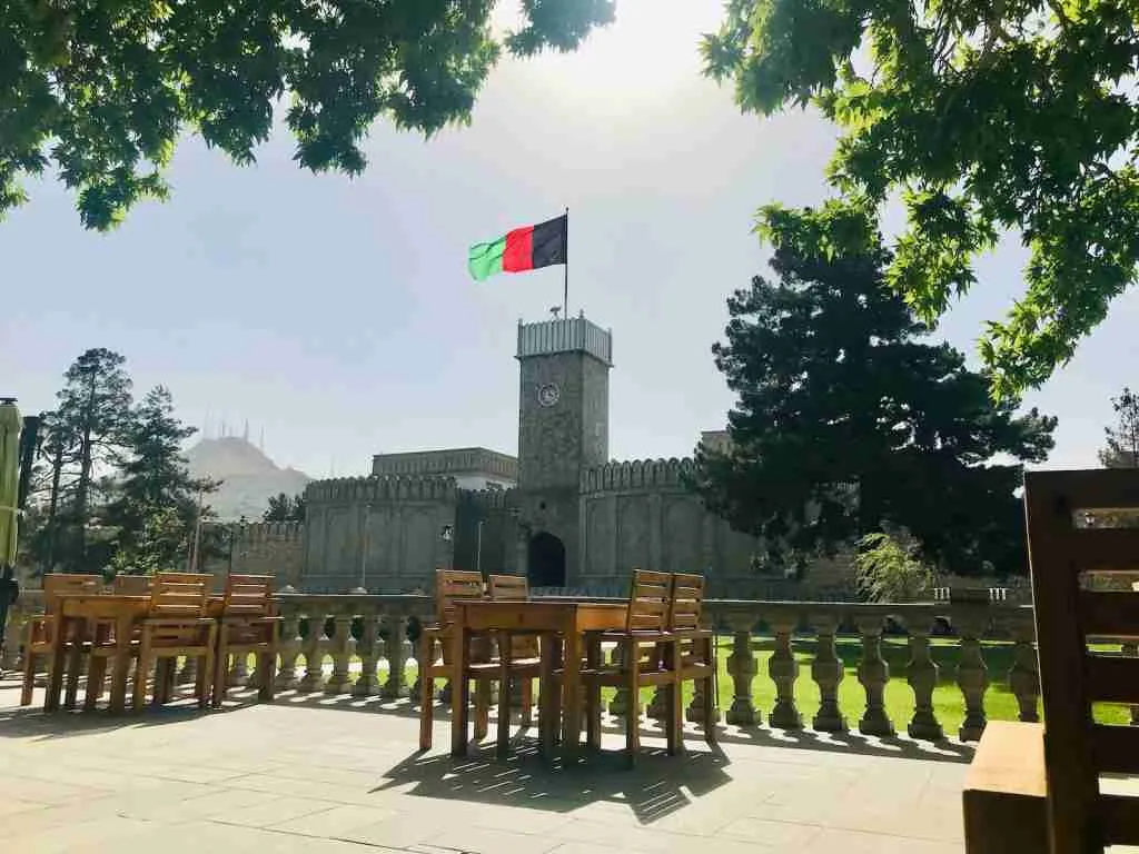 25 Fun Facts About Afghanistan: Exploring the Untold Wonders 4 a large building with a flag on top of it