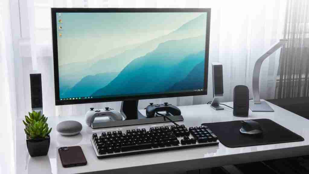 24 Fun Facts About Computers: Embark on a Tech Adventure 1 black computer keyboard beside silver imac