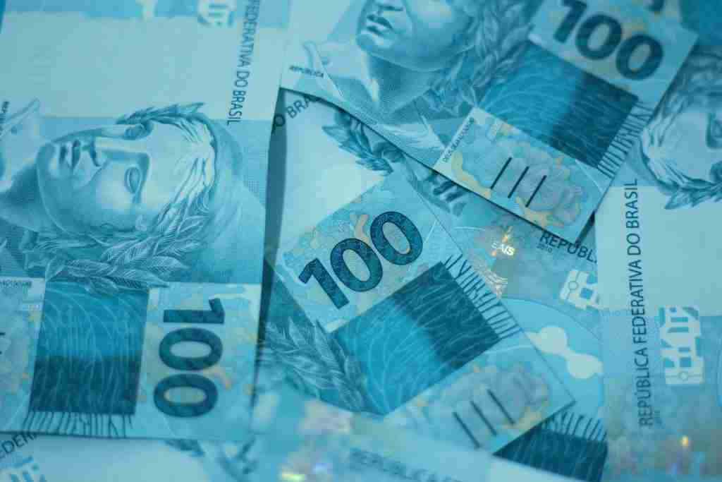25 Fun Facts About Brazil: Surprises You Never Expected 5 a pile of ten hundred dollar bills sitting on top of each other