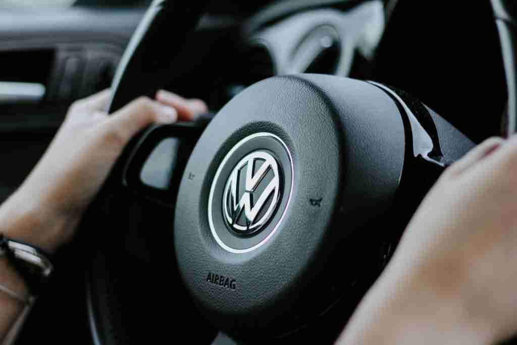 25 Fun Facts About Germany | From Fairy Tales to Fanta 1 person holding black Volkswagen steering wheel in closed-up photo