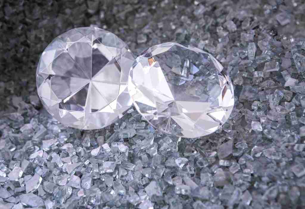 25 Fun Facts About India | You Didn’t Learn in School 5 two diamonds sitting on top of a pile of crushed glass