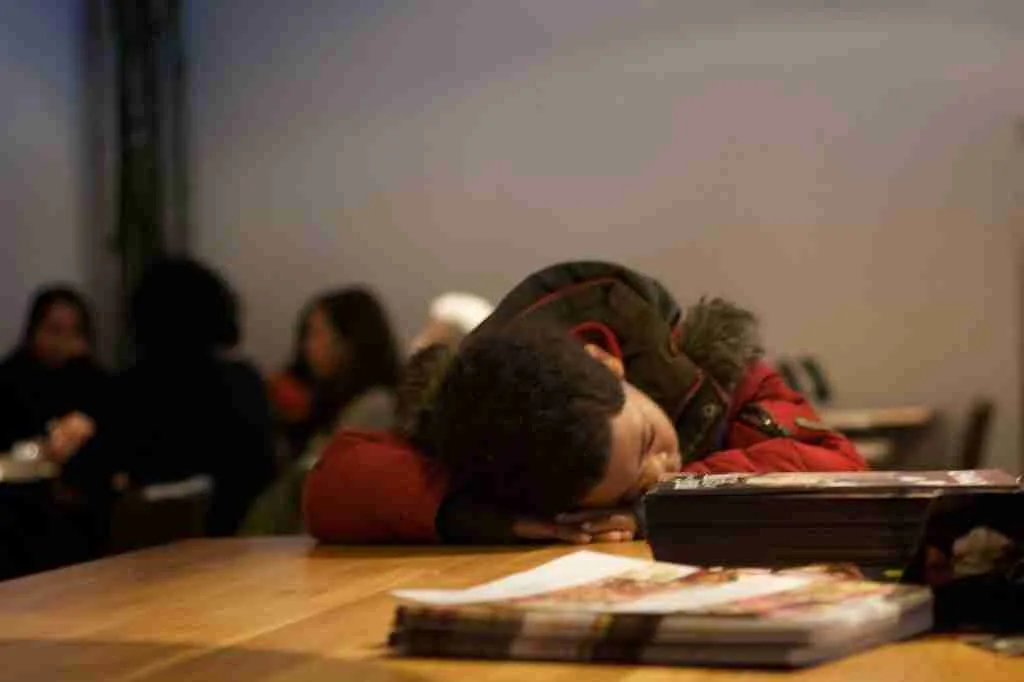Fun Facts About Monday: History, Myths & Surprising Trivia 1 A school boy holding his head on a table
