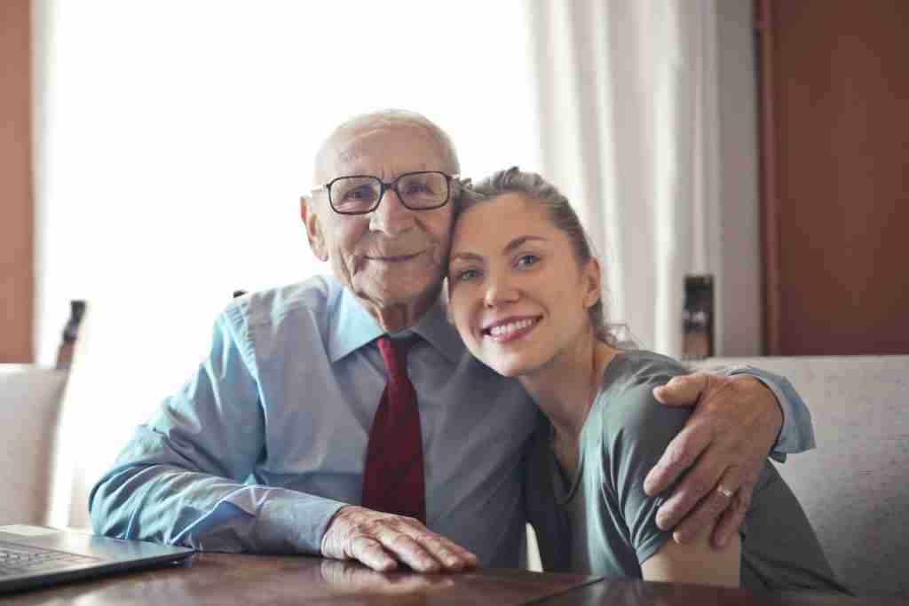 24 Fun Facts About Pisces You Didn't know 5 Positive senior man in formal wear and eyeglasses hugging with young lady while sitting at table