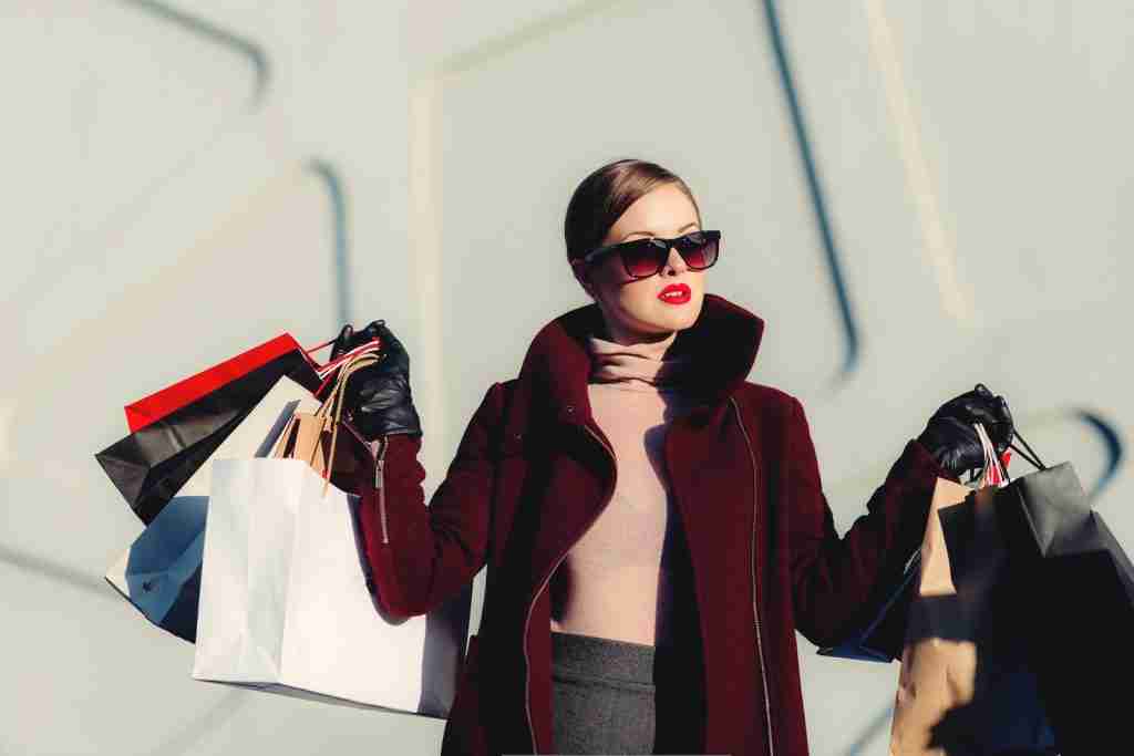 25 Fun Facts About Aquarius | What No One Tells You 4 photo of woman holding white and black paper bags