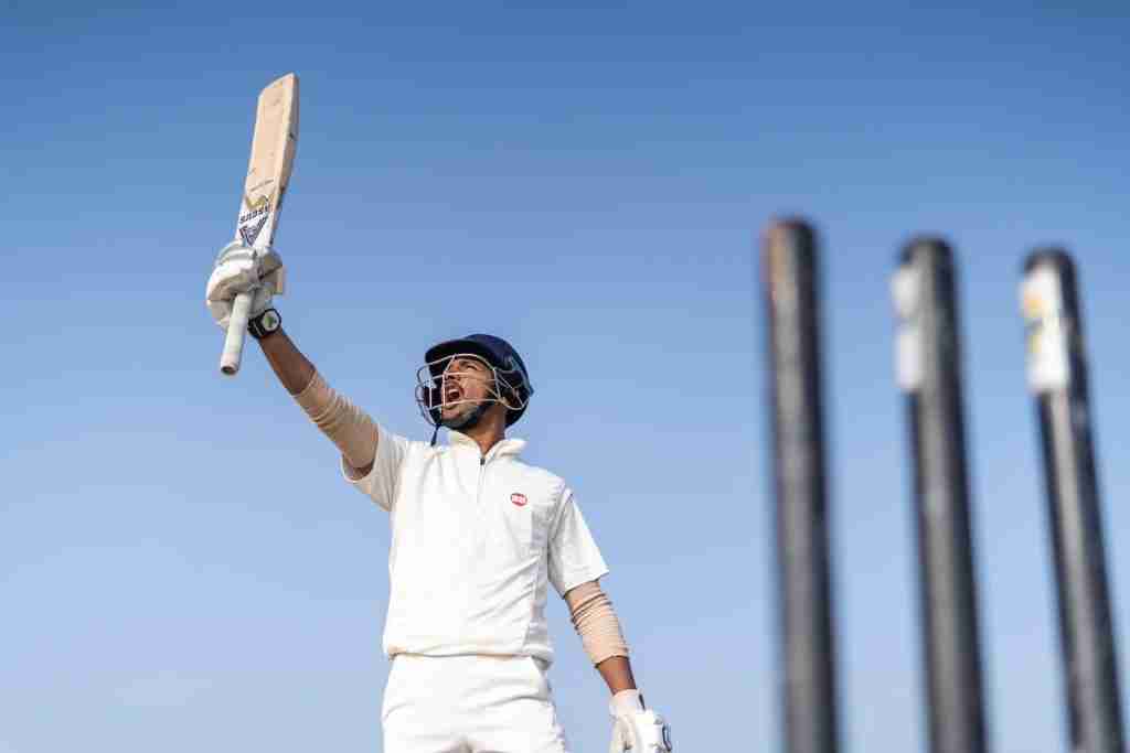 21 Facts About Cricket You May Not Know 1 a man holding a bat and wearing a helmet