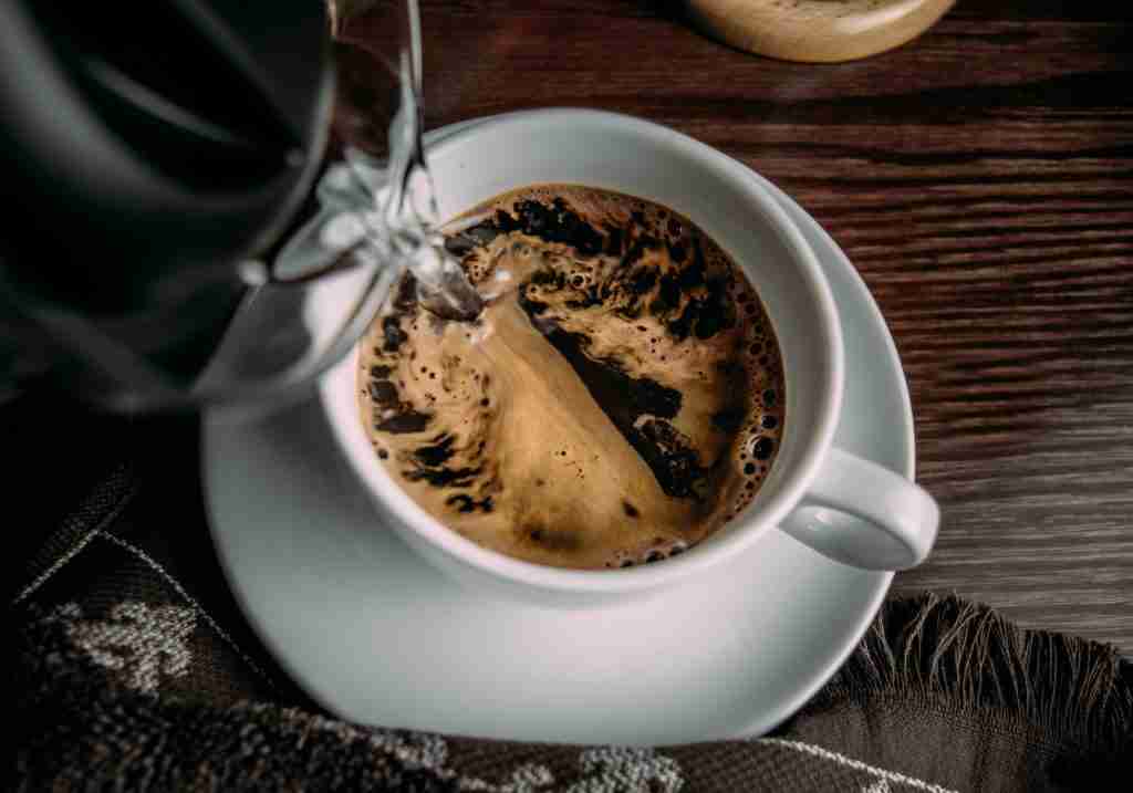 26 Fun Facts About Coffee | From Beans to Strange Uses 2 white ceramic mug with coffee