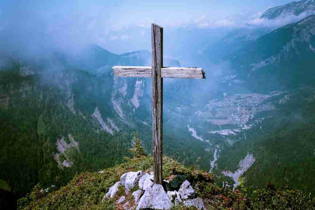 25 Facts About Kanye West You Didn't Know 3 photo of brown wooden cross at cliff