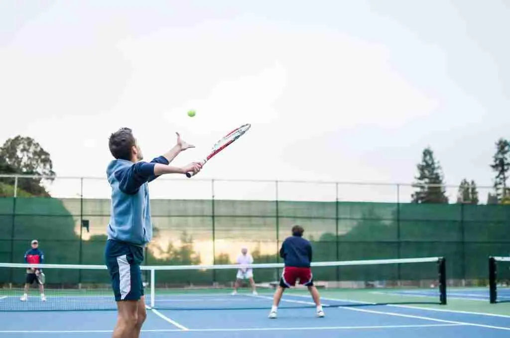 25 Fun Facts About Tennis You Didn't Know 6 four men playing double tennis during daytime
