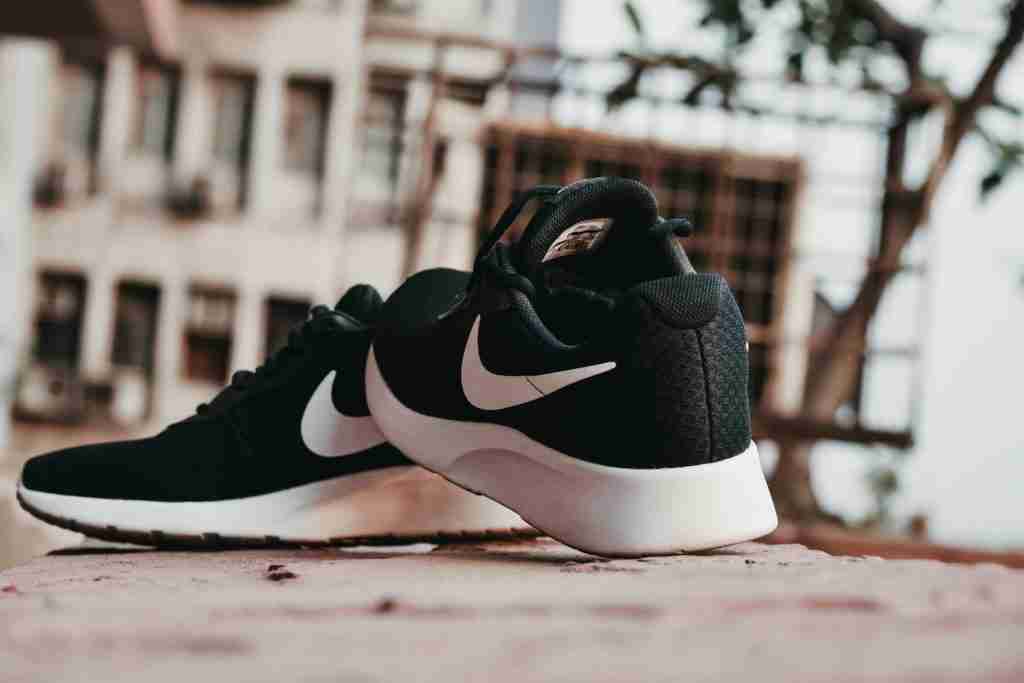 24 Interesting Facts About Nike (Just Know It) 1 Macro Photography of Pair of Black-and-white Nike Running Shoes