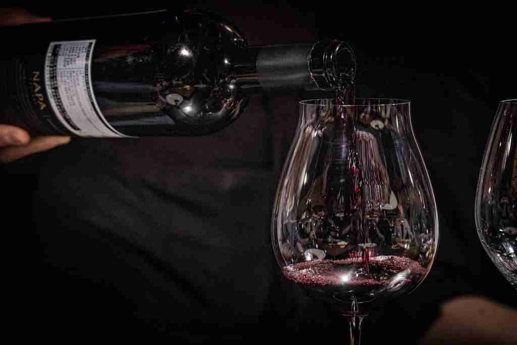 27 Fun Facts About Fungi | Marvels of Decomposers 1 a person pouring red wine into a wine glass