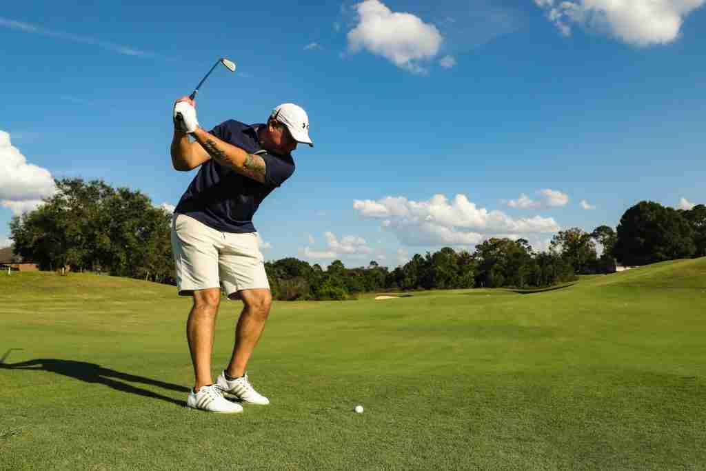 24 Fun Facts About Golf That Will Blow Your Mind 3 man in black shirt and white shorts playing golf during daytime