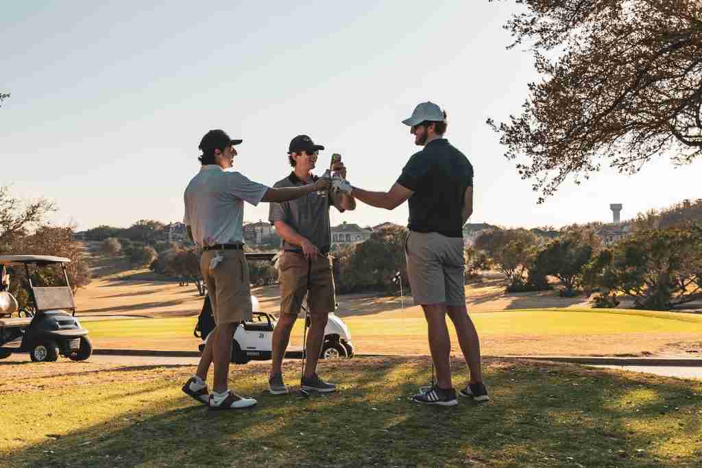 24 Fun Facts About Golf That Will Blow Your Mind 4 man in black t-shirt and brown shorts playing golf during daytime