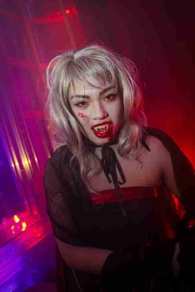 25 Fun Facts About Garlic | Pungent Powerhouse 2 a woman dressed as a zombie in a dark room
