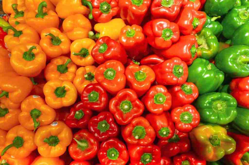 25 Fun Facts About Food | Bite into Surprise 3 orange bell peppers on white ceramic plate