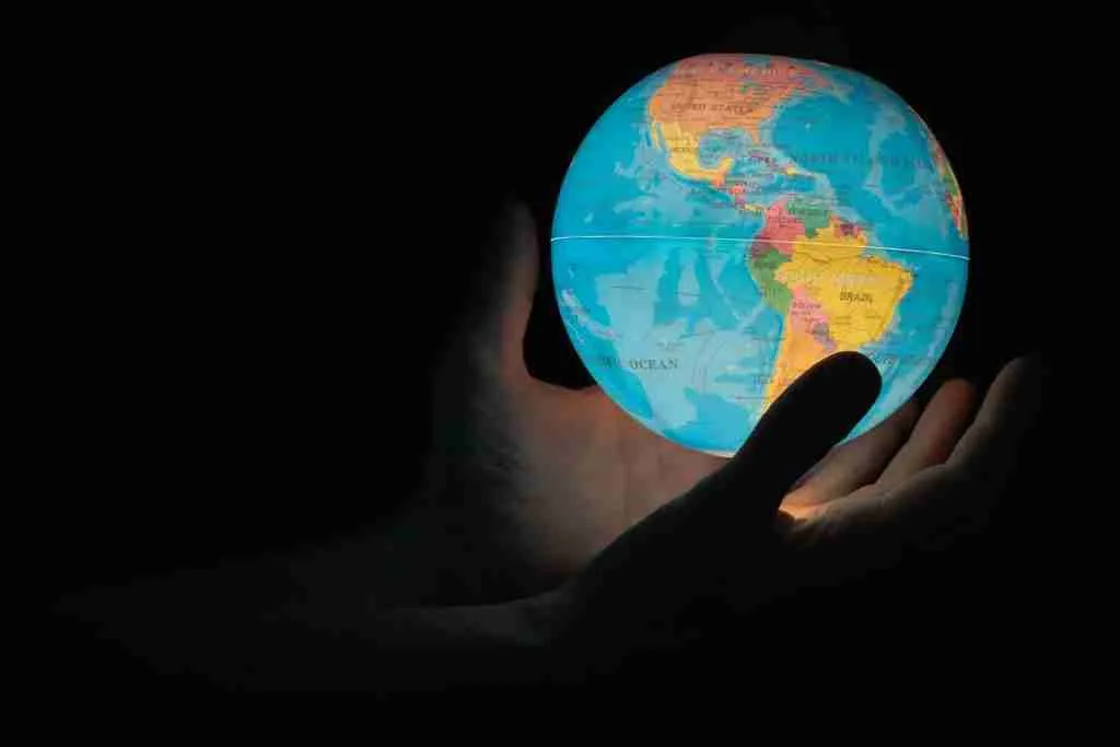 24 Fun Facts About World | Ignite Your Curiosity 2 blue and brown globe on persons hand