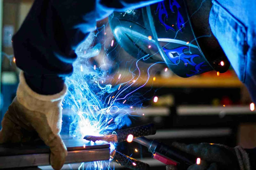 25 Fun Facts About Helium That will Will Surprise You 5 man holding gray steel frame