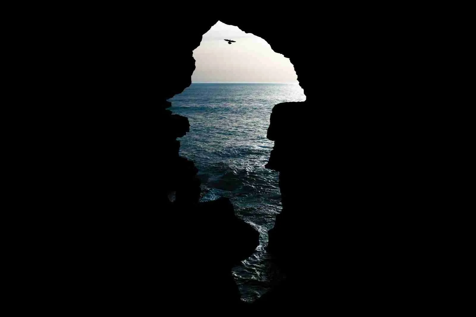 23 Fun Facts About Morocco | Unexpected Wonders 4 a bird flying over the ocean from a cave