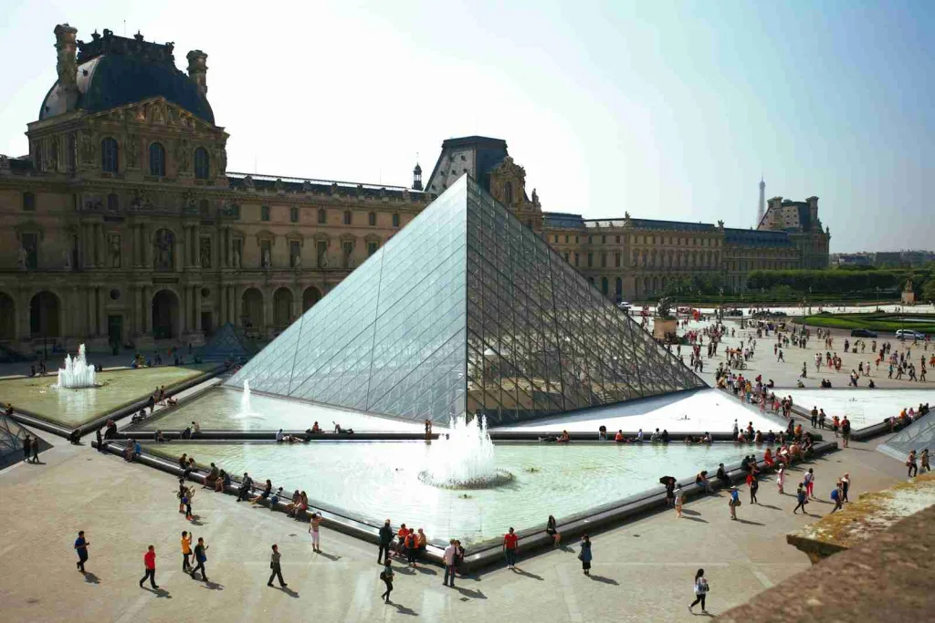 29 Fun Facts About French You Need to Know 1 people walking around pyramid landmark