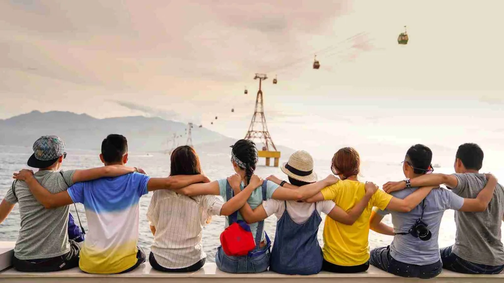 22 Fun Facts About Valentine | Love Myths and Legends 3 people holding shoulders sitting on wall