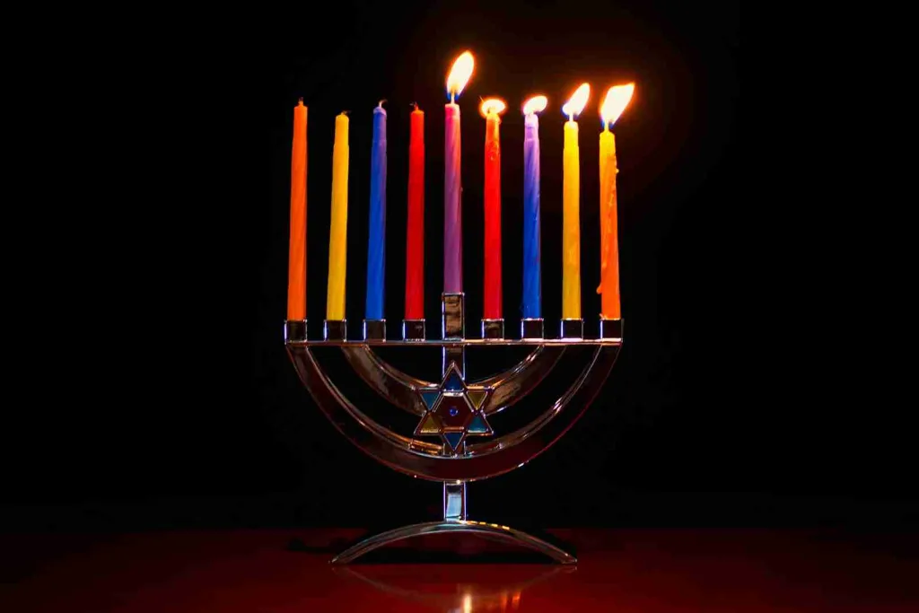 25 Fun Facts About Holidays | Surprising Customs Revealed 1 lighted candles on stainless steel candle holder
