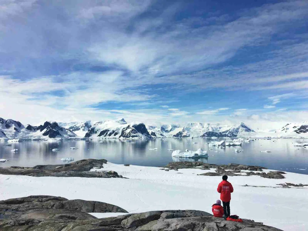 24 Fun Facts About the Arctic | Beyond Ice and Snow 5 two person standing on snow a field