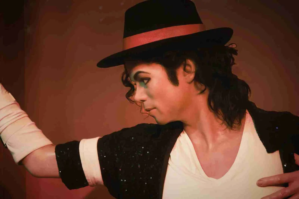 23 Fun Facts About Michael Jackson | From Moonwalks to Music 1 a man in a top hat and black jacket : Fun Facts About Michael Jackson