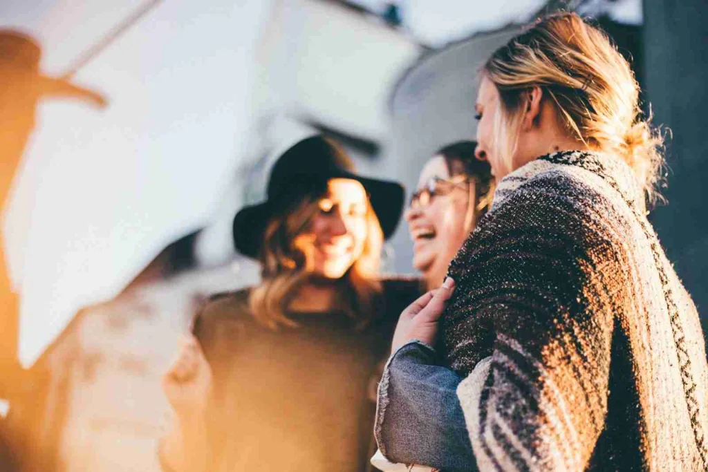 25 Fun Facts About The Color Red/ Red Alert 1 people laughing and talking outside during daytime
