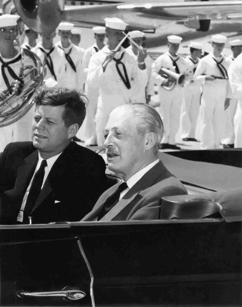 29 Fun Facts about JFK | The Untold Stories and Trivia 3 a black and white photo of two men in a car