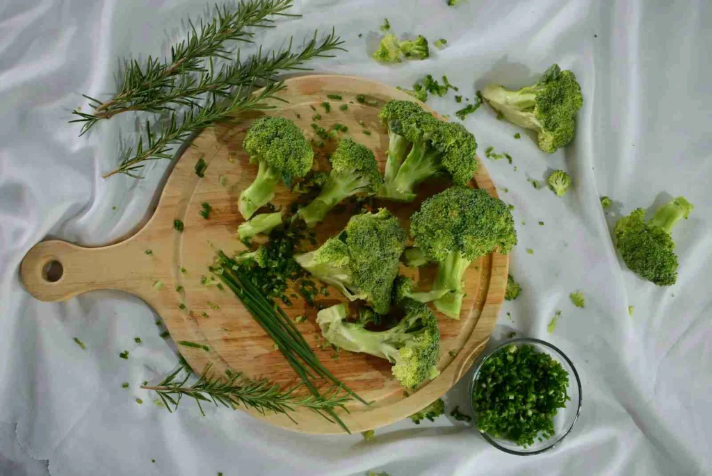 23 Fun Facts About Broccoli: The Ultimate Superfood 4 green broccoli on brown wooden plate