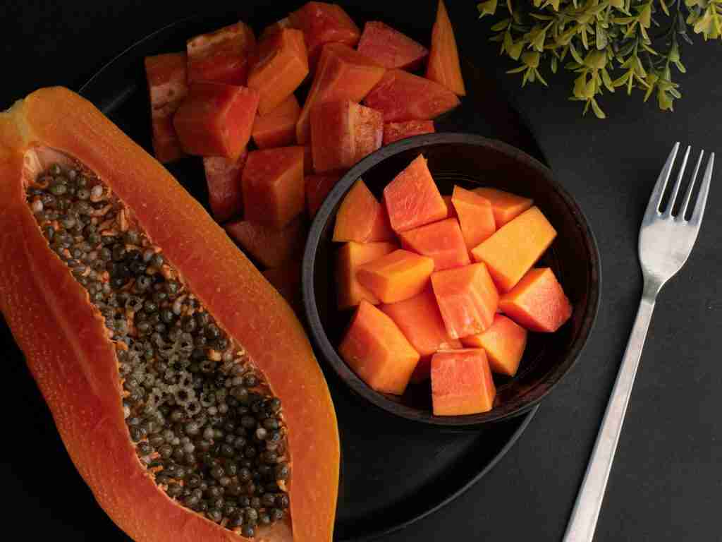 25 Interesting Facts About Fruits That Will Amaze You 4 sliced carrots on black plate
