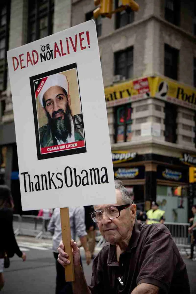 25 Facts about 9/11 | Little-Known Heroes and Stories 1 man sitting holding Dead Not Alive! Thanks Obama placard