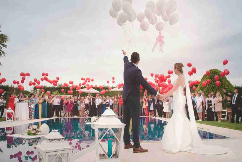 24 Fun Facts About June That Will Blow Your Mind (2025 Facts) 2 photo of a man and woman newly wedding holding a balloons